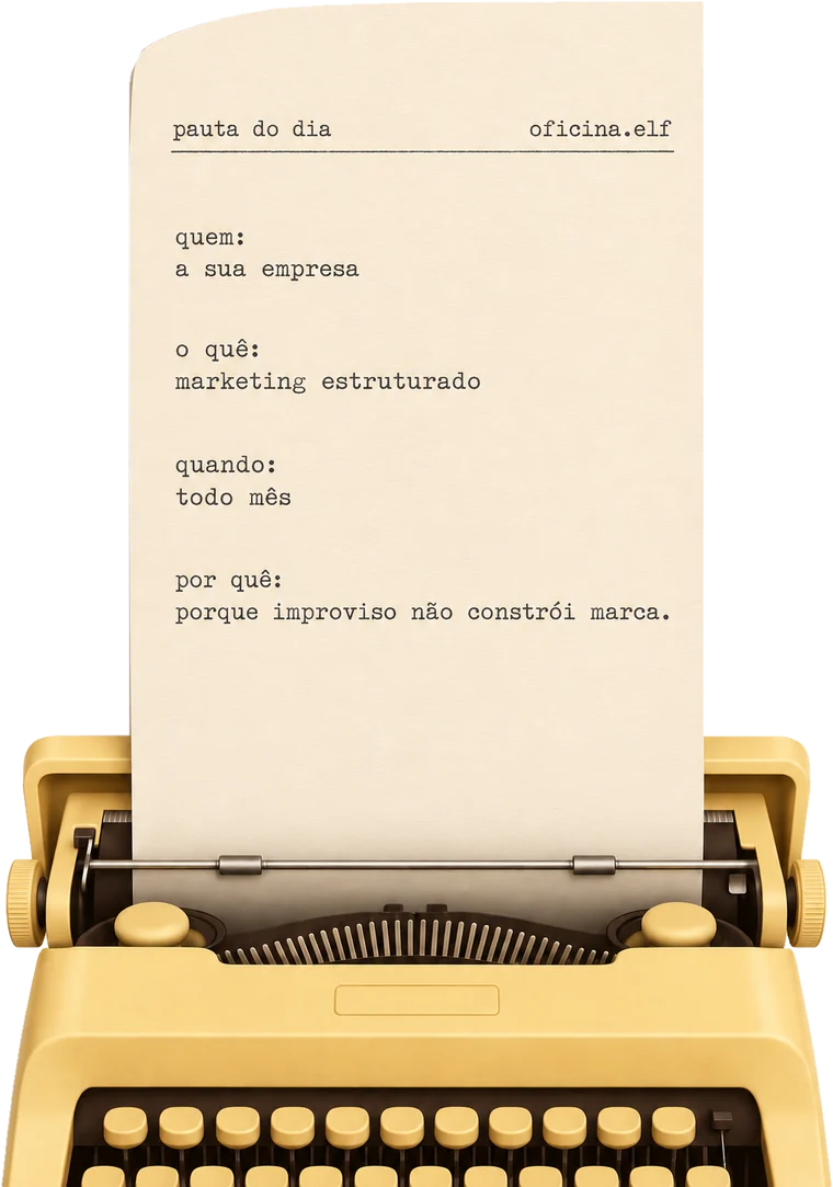 Máquina de escrever com a pauta do dia: quem, a sua empresa; o quê, marketing estruturado; quando, todo mês; por quê, porque improviso não constrói marca.